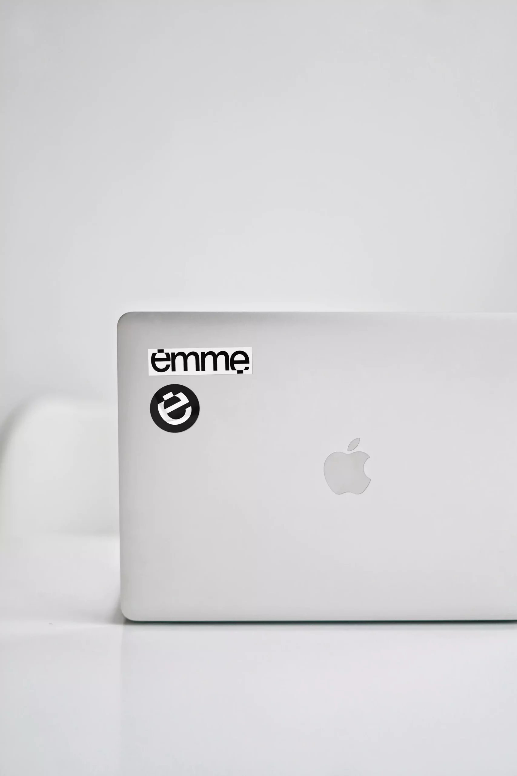 Visual Identity for Emme - Stickers on Macbook